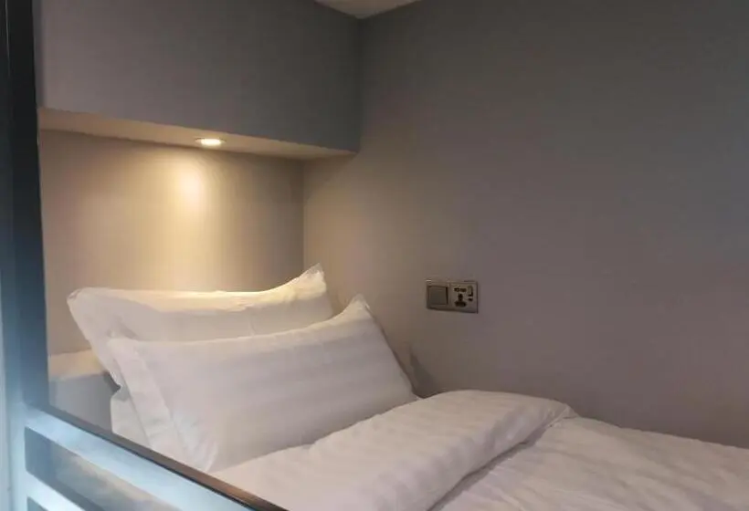Standard Neljän Hengen Huone Jaettu Kylpyhuone, Sunbay Inn