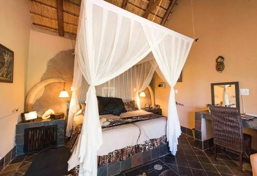 キングサイズベッドのデラックスルーム, African Rock Lodge