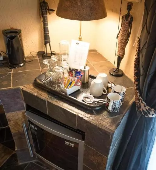 キングサイズベッドのデラックスルーム, African Rock Lodge