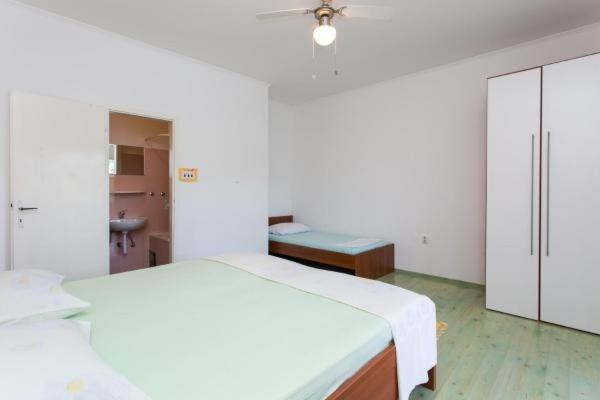 Triple Room Sea View, Guest House Busurelo