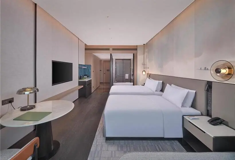 اتاق استاندارد با چشمانداز دریا, Hilton Haikou