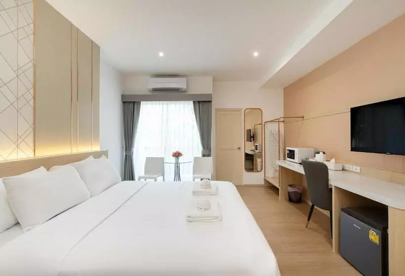 キングサイズベッドのデラックスルーム, Riski Residence Ngamwongwan