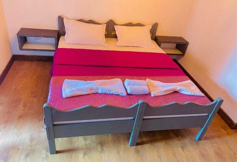 חדר דלוקס, Km 0