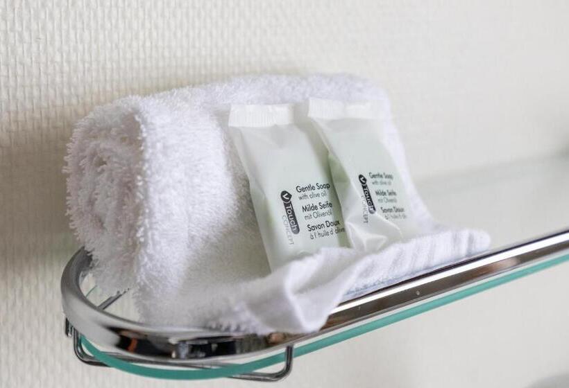 חדר סטנדרט לשלושה, De Klok