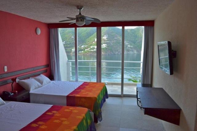 Номер Deluxe Вид на Море с Балконом, Bahia Taganga