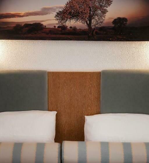 标准工作室, Kapsohora Inn