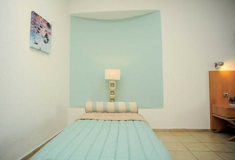 标准工作室, Kapsohora Inn