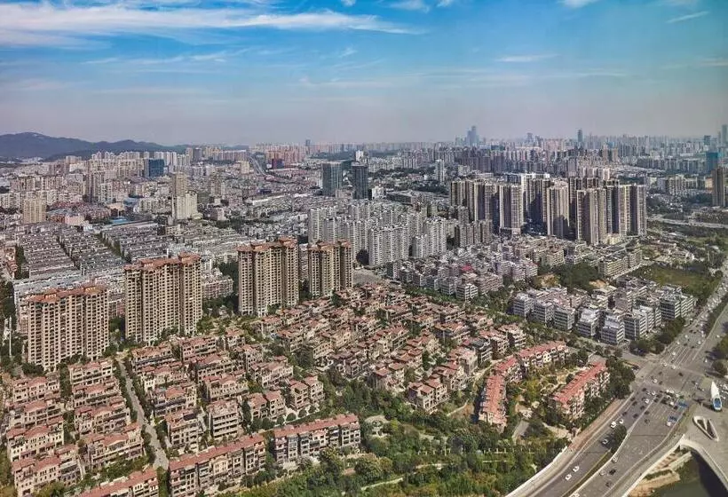 キングサイズベッド、シティビューデラックスルーム, Meixi Lake Hotel, A Luxury Collection Hotel, Changsha
