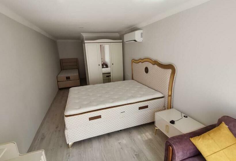 اتاق استاندارد سه تخته با چشم‌انداز باغ, Zeyos Lodge Hotel&restaurant