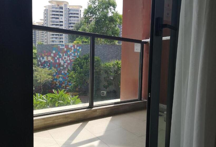 חדר סטנדרט עם מרפסת ונוף לגינה, Marriott Resort Xiangshui Bay