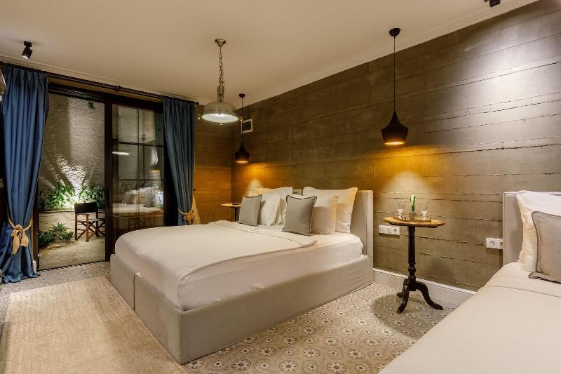 Quarto Triplo Standard Vista Jardim, Alacati Port Ladera Hotel   Adults Only