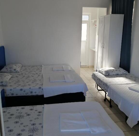Standard Quadruple Room Sea View, Uysal Motel Beach