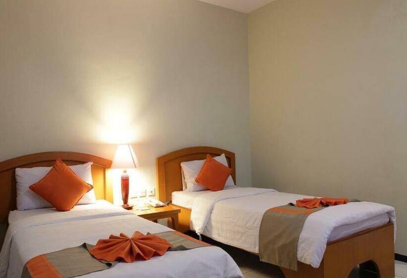 이그제큐티브 룸, Catur Putra