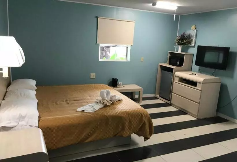 身障者適用キングサイズベッドルーム, Apollo Inn Cocoa