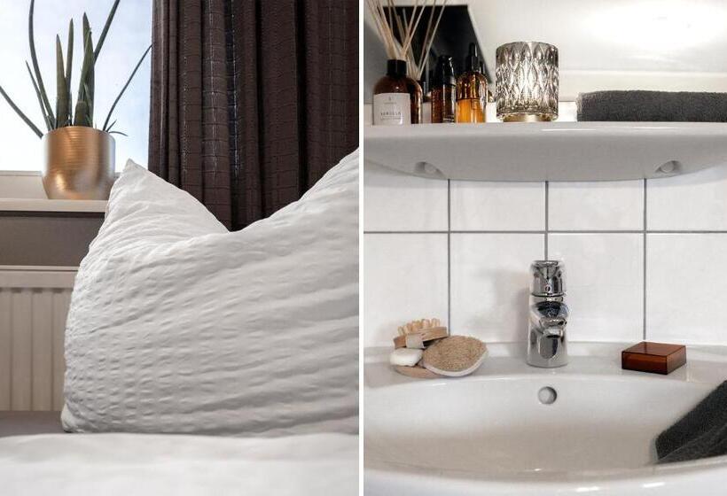 اتاق استاندارد سه تخته با سرویس بهداشتی مشترک, Pension Haus Am Kohfurth