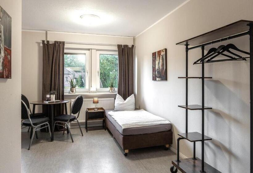 اتاق استاندارد سه تخته با سرویس بهداشتی مشترک, Pension Haus Am Kohfurth