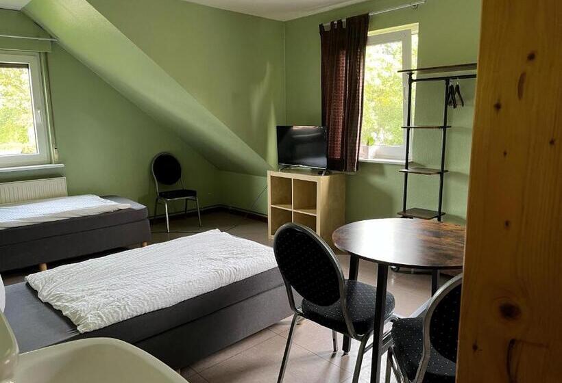 اتاق استاندارد سه تخته با سرویس بهداشتی مشترک, Pension Haus Am Kohfurth