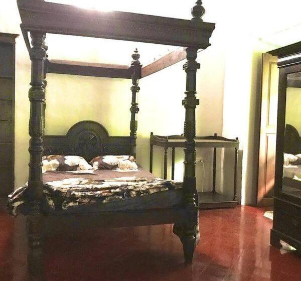 חדר סטנדרט לשלושה עם נוף לגינה, Heritage House : The Honeymooners Houstel