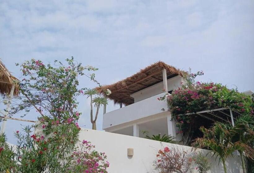 غرفة قياسية رباعية مطلة على الحديقة, Bungalows Punta Conejo