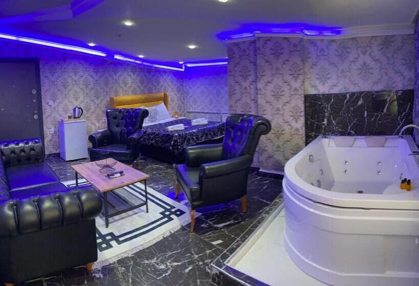 Quarto Estandar Cama King, Ottoman Suit Apartment &
