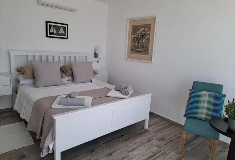 استودیوی لوکس, Amigos Para Sempre Casa De Hóspedes