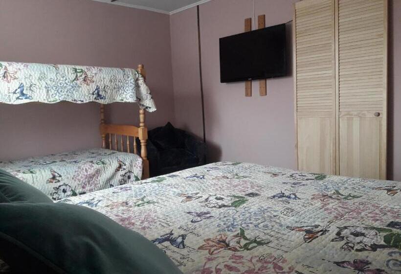 اتاق چهار تخته با دستشویی مشترک, Hostal Torres Del Paine 2