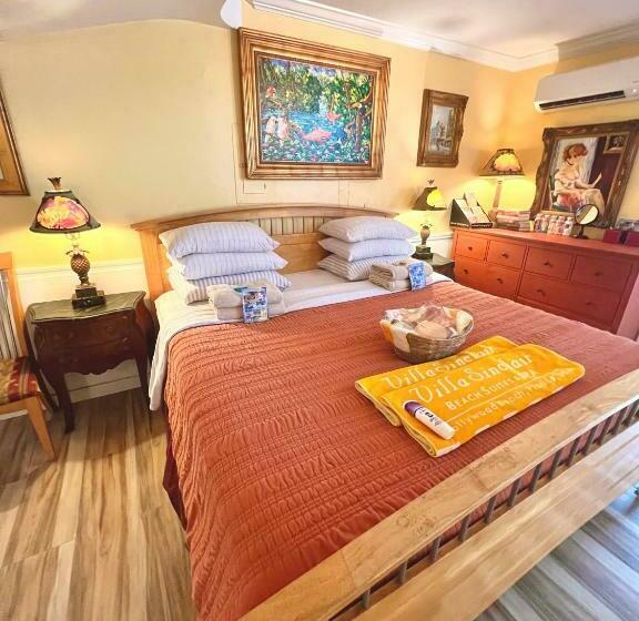 带大床的标准工作室, Villa Sinclair Beach Suites And Spa