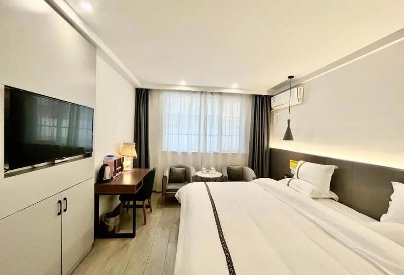 キングサイズベッドのデラックスルーム, Tianshui Times Hotel Zhangjiagang