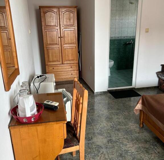 غرفة عائلية, къщаперла