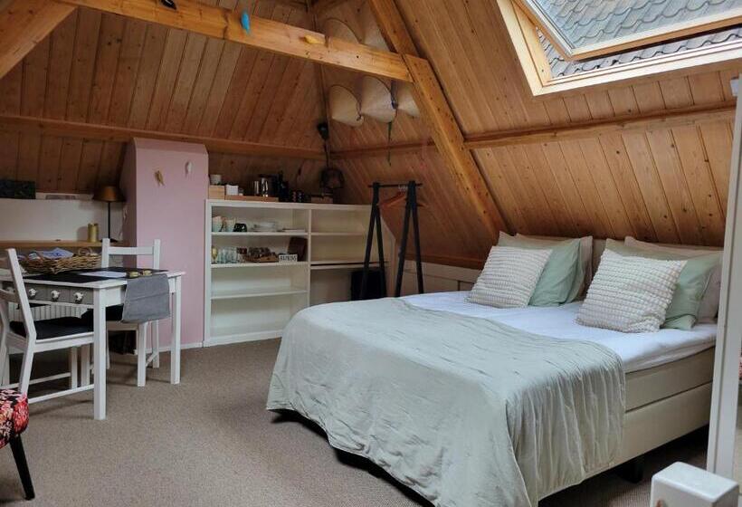 豪华房间, De Buurvrouw Nr.18