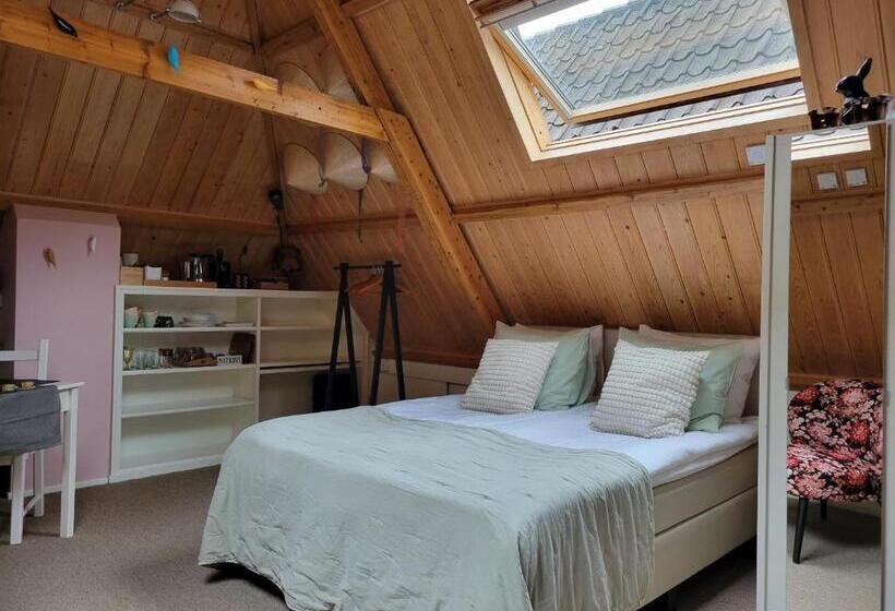 豪华房间, De Buurvrouw Nr.18