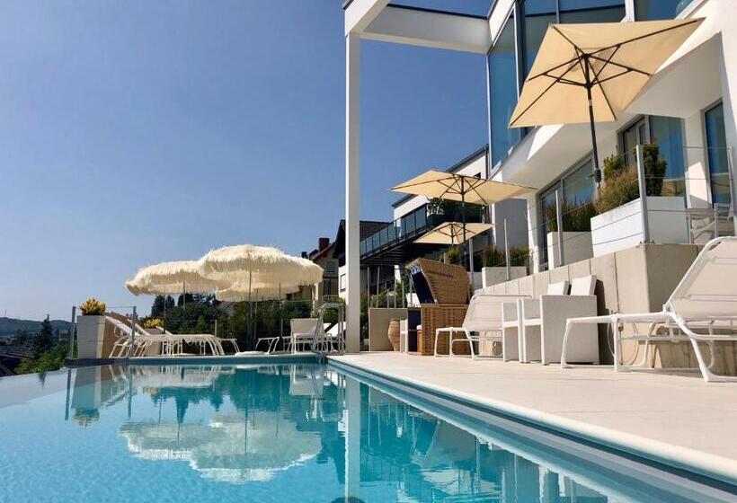 Junior Suite Vista Piscina, Weingut Aparthotel Olinger