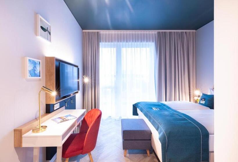 Escritório Estándar, Holiday Inn The Niu, Flower Konstanz, An Ihg