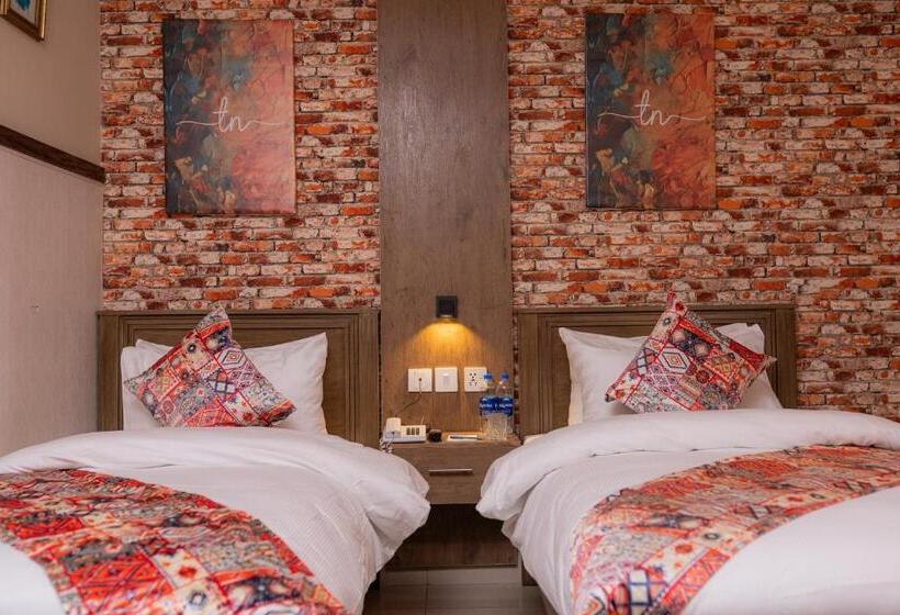 Quarto Deluxe, The Nexus Hotel Apartments