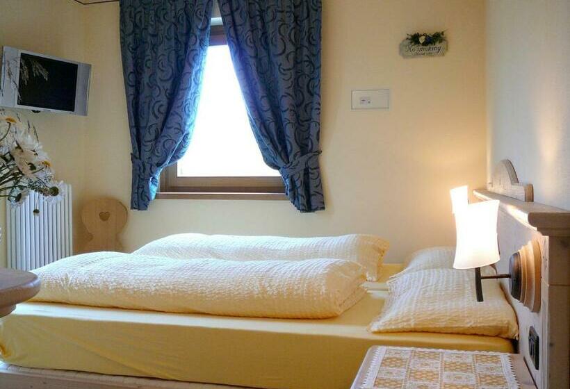 Quarto standart com varanda, Sciatori