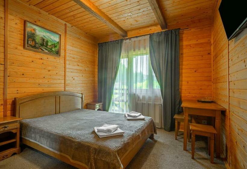 Suite z Balkonem, Arnika