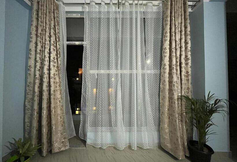 דירה בת חדר שינה 1 עם מרפסת, Beltola Serenity Homestay