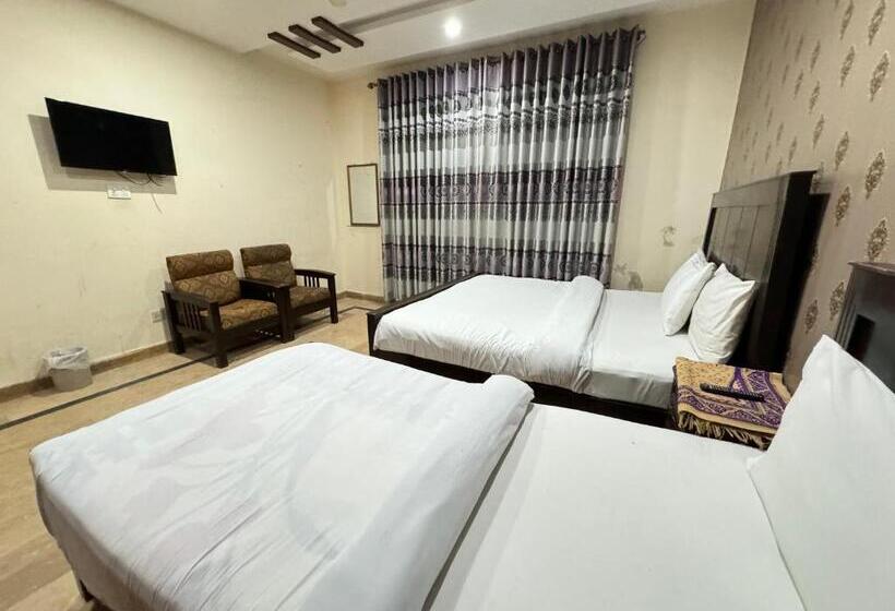 استودیو خانوادگی, Millat Guest House G9 4