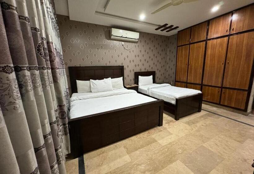استودیو خانوادگی, Millat Guest House G9 4