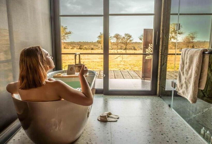 חדר דחוקס עם מיטת קינג, Ximuwu Safari Lodge