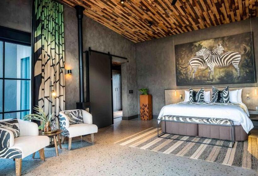 חדר דחוקס עם מיטת קינג, Ximuwu Safari Lodge