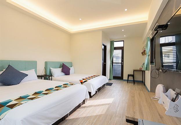 اتاق استاندارد چهارنفره با چشم‌انداز باغ, 羅東夜市舒果shugo B&b 近清溝夜市 國旅卡特約店 配合手作早餐店及租車行