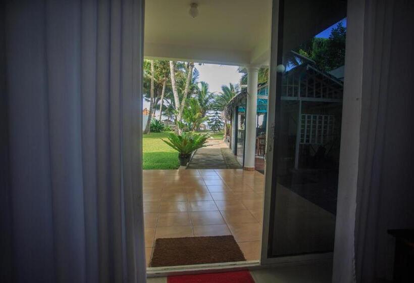 Camera Quadrupla Standard Vista Giardino, Tharanga Surfing Villa