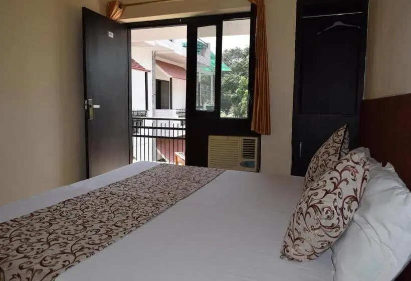 Habitación Deluxe Cama King Vista Ciudad, Moksha