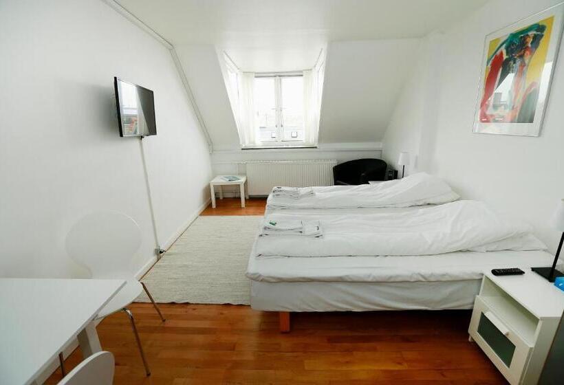 スタンダードシティビュールーム, 9 Små Hjem