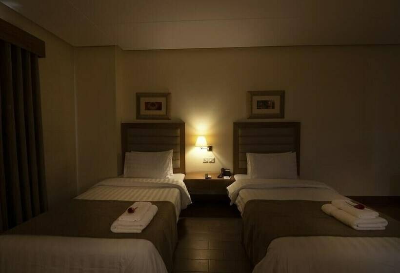 Deluxe Zimmer, One Tariq Road Multan