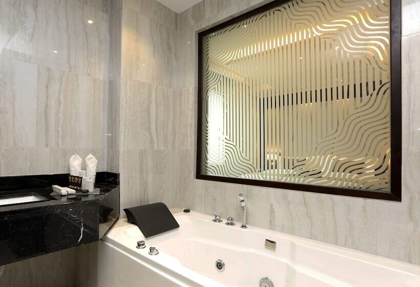 キングサイズベッドのデラックスルーム, Swiss Flora Inn Hotel Riyadh