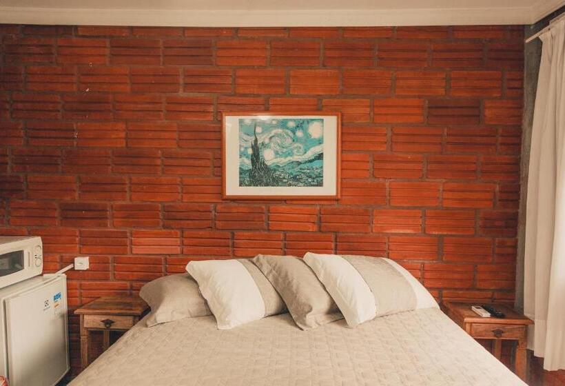 اتاق استاندارد چهارنفره با چشم‌انداز باغ, A Ilha Verde Hotel Pousada Na Praia