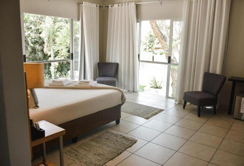 חדר דחוקס עם מיטת קינג, Elegant Lodge & Conference Center