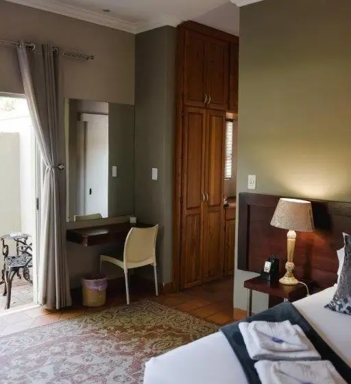 キングサイズベッドのデラックスルーム, Elegant Lodge & Conference Center